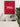 Trinidadian Food Poster featuring a bold red background with typography showcasing popular Trinidad & Tobago dishes like Doubles, Pelau, Roti, Callaloo, and Black Cake. A stylish wall decor piece celebrating Caribbean cuisine and culture.