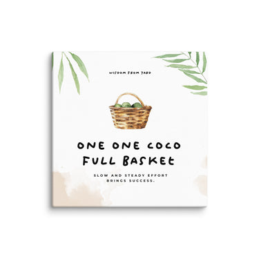 6x6 Square canvas print featuring the Jamaican proverb “One One Coco Full Basket” with tropical leaf accents on a white background.